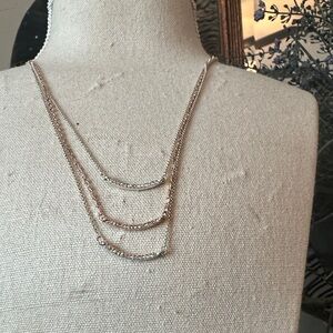 silver and golf choker.